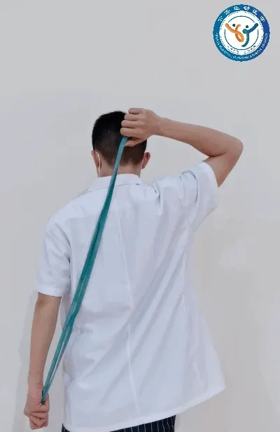 Assisted internal rotation behind the back
